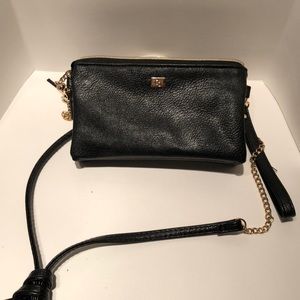 Black faux leather crossbody bag with strap